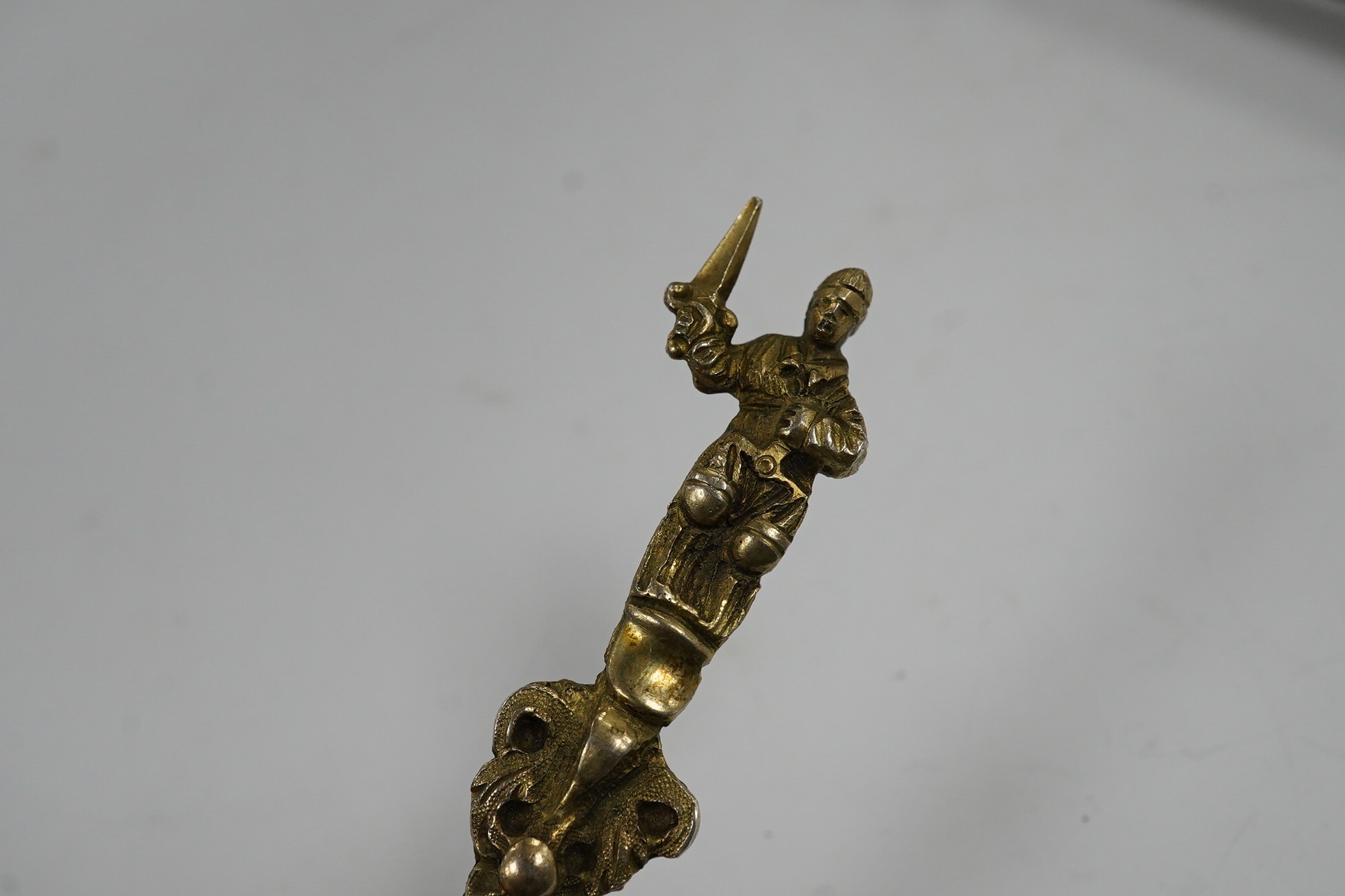 A 19th century Austro Hungarian white metal vase, 11.7cm and other items including a silver gilt spoon, silver stilton scoop, silver match sleeve, silver inlaid glass mats and plated items etc. Condition - poor to fair